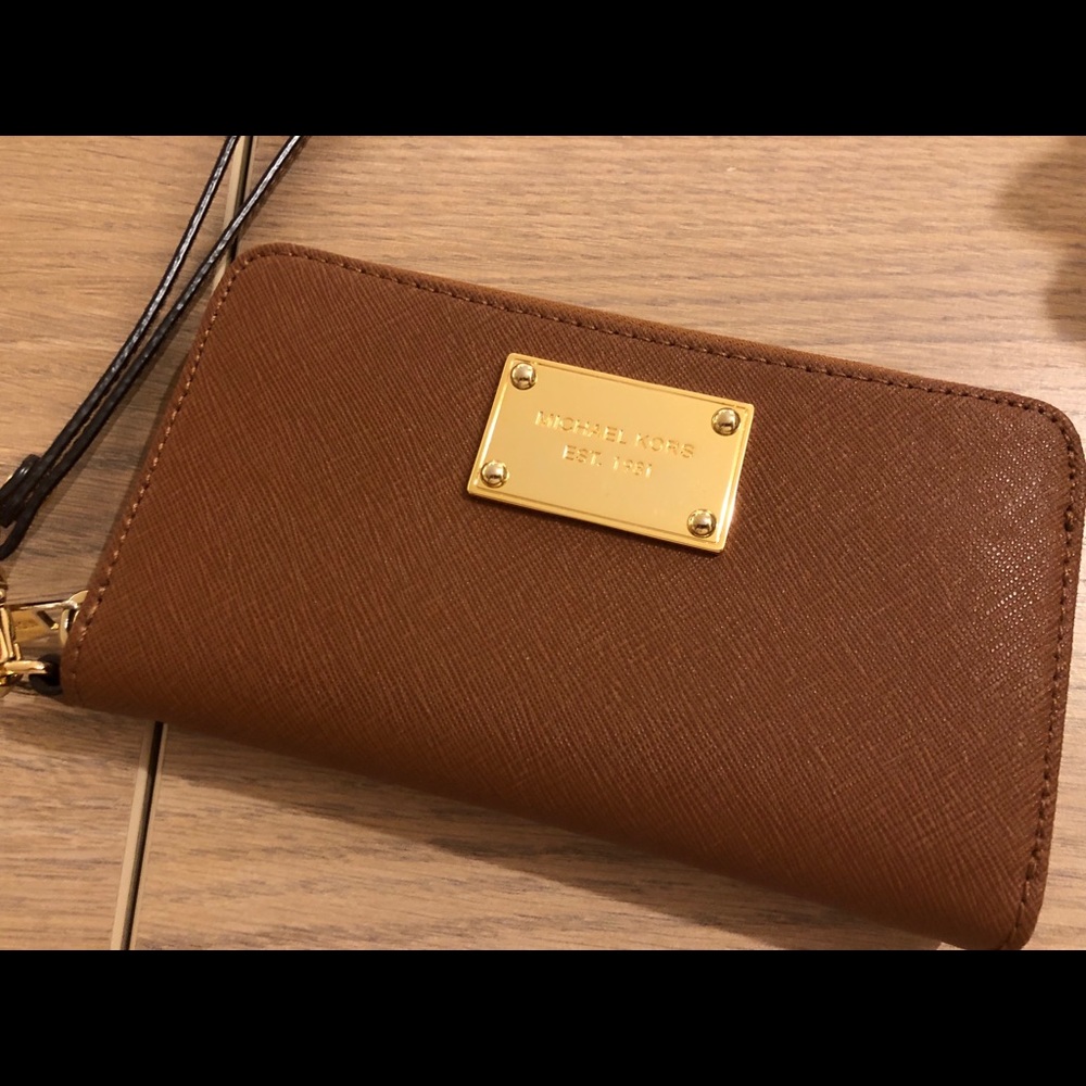 Authentic Michael Kors leather wristlet / wallet